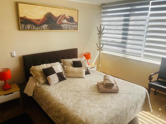 Depto 1 Dormitorio Centro Blanco 702 estacionamiento