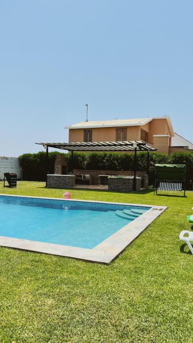 Casa de campo en Chincha con piscina privada y parrilla hasta 14 personas