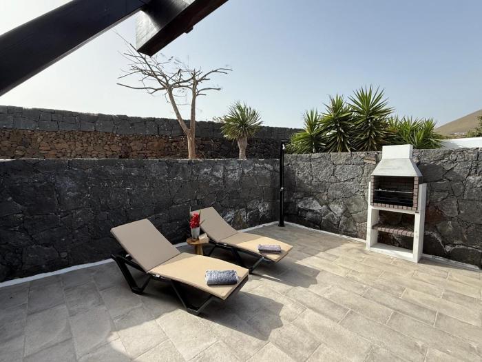 Villa Blanco villa privada con patio volcánico terraza barbacoa
