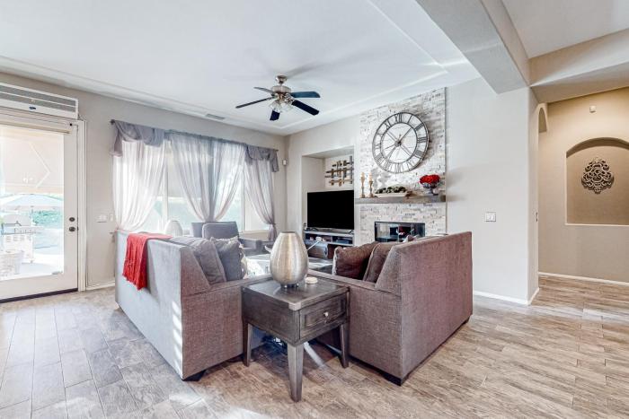 Luxury home with an enclosed yard pool pool spa