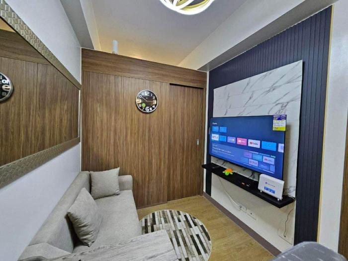 Condo Staycation-resort near airport and SM Bicutan with 3 pools and playground