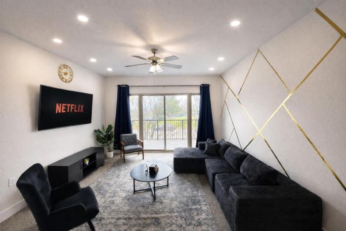 Designer UAB Condo King Bed Balcony View 2