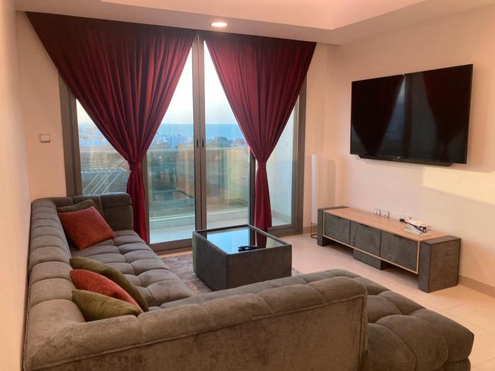 Modern 2BR Oasis - Balcony With Sea View