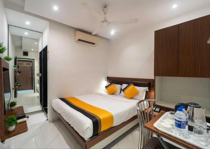 Glitz Rexton Inn - Near IIT Powai