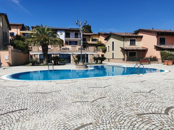 "Appartamento Il Gelsomino", vista panoramica, piscina idro, aria condizionata, parcheggio privato, patio esterno con barbecue