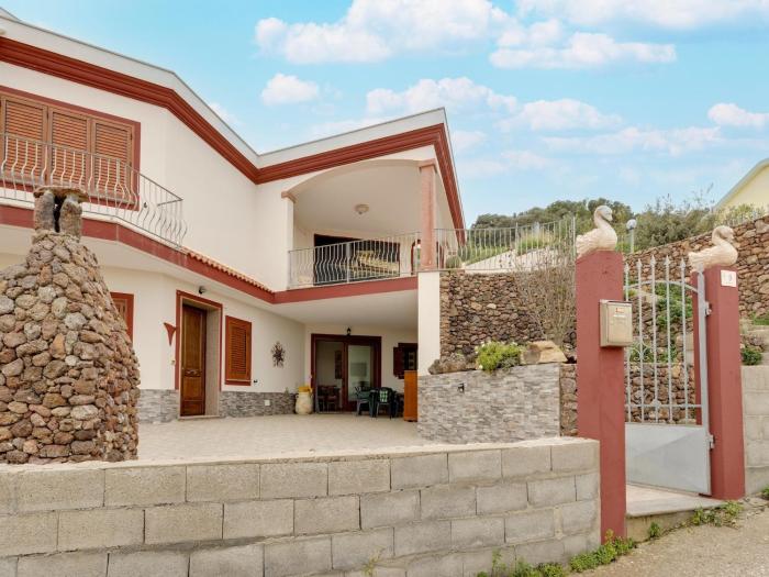 With large private outdoor space and parking