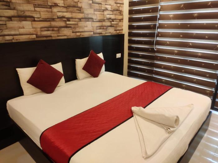 EMERALD GRAND Rooms and Serviced Apartment