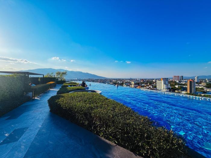 The Astra SkyRiver Luxury Condo with Rooftop Swimming Pool and Gym
