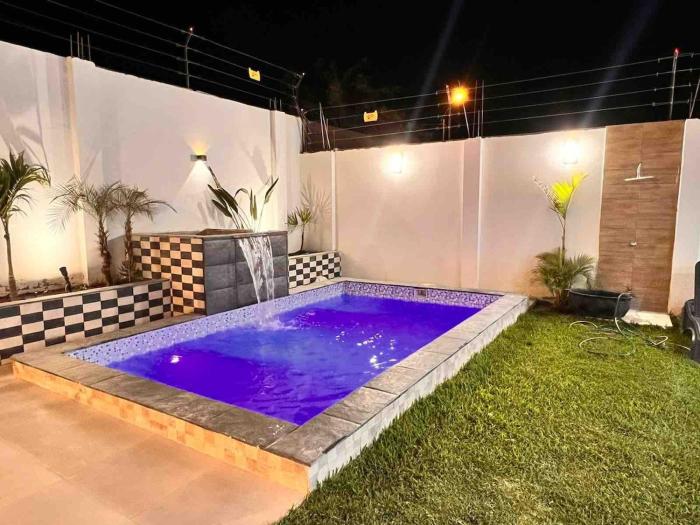 house with pool, grill, bar and garden