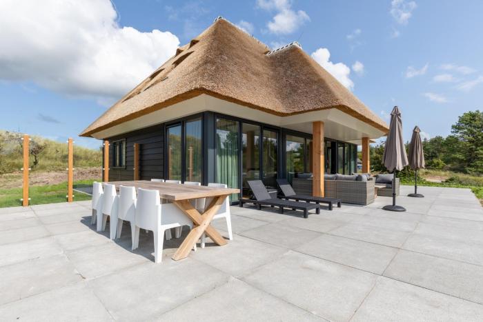 Luxe 8 persoons Welness Villa Nova in het Duingebied tussen Nes en het Strand