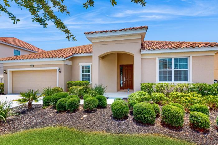 Spacious, lakefront home with a lanai, private pool, spa, & washerdryer
