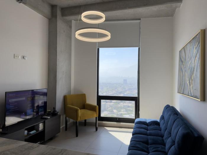 Suite Elegante con Vistas a la Ciudad y estacionamiento