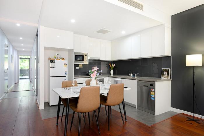 Ryde Warm 2BR Stay with Pool near Train Station