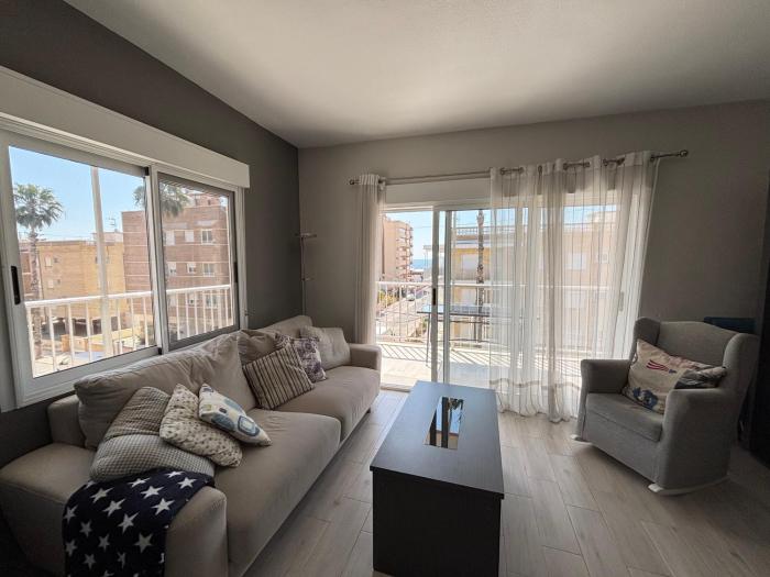 Three bedroom top apartment by the beach