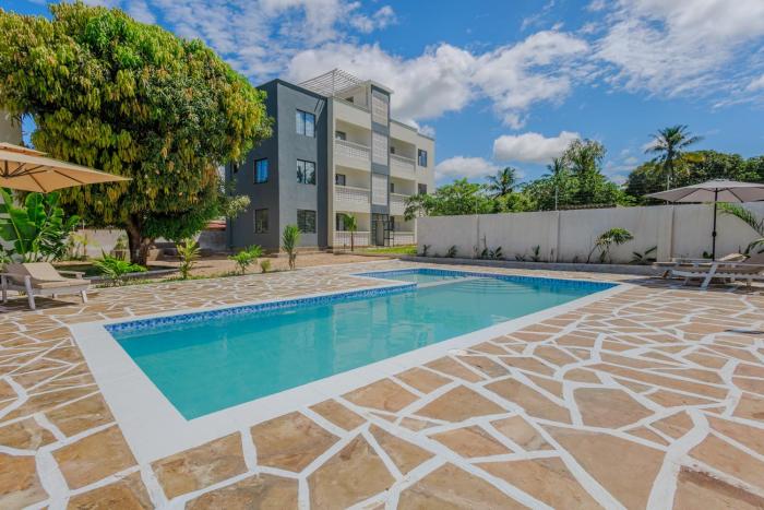 Marahaba Holiday Suites Ground Floor 1BR 5 Min Drive to Nomad Beach