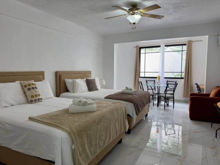 01 - Double Queen Room w Pool & Secure Stay