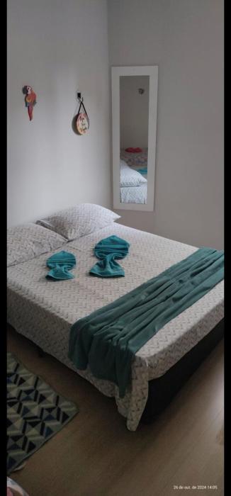 APARTAMENTO ACONCHEGANTE com brinquedoteca estacionamento Wi-Fi a duas quadras da praia no bairro da Guilhermina