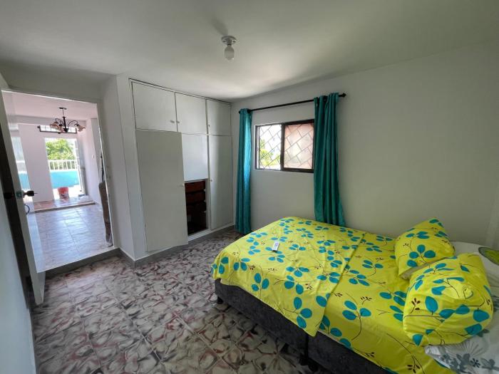 Habitaciones amobladas con baño privado