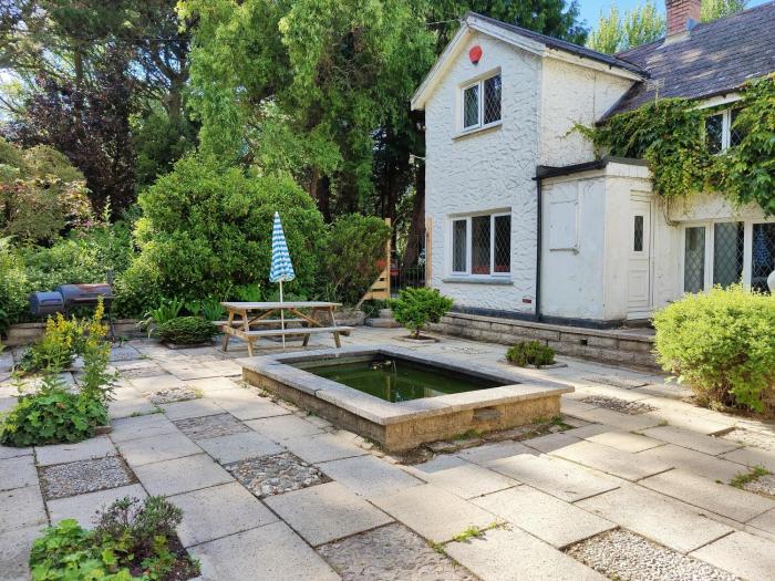 Croft Cottagein acres of mature gardens