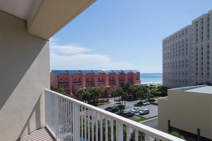 Beachfront Condo with Balcony Pools and Gym