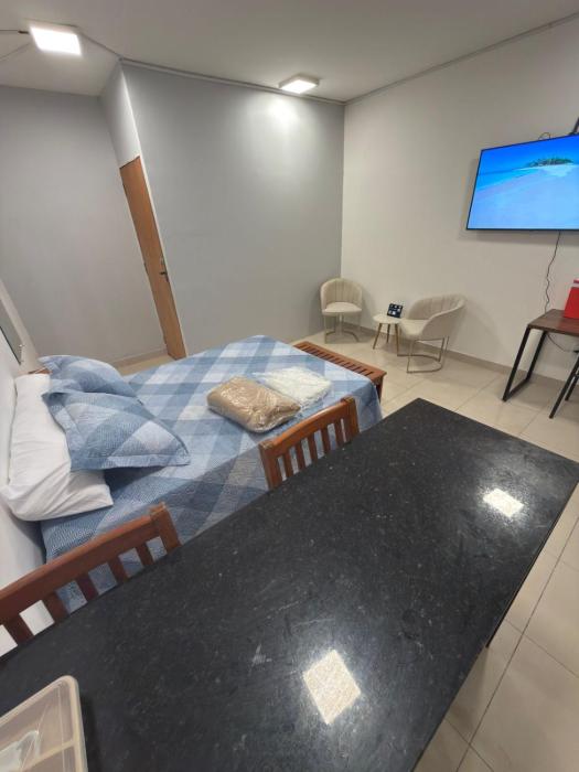 15 Mini casa com ar perto da praia estacionamento
