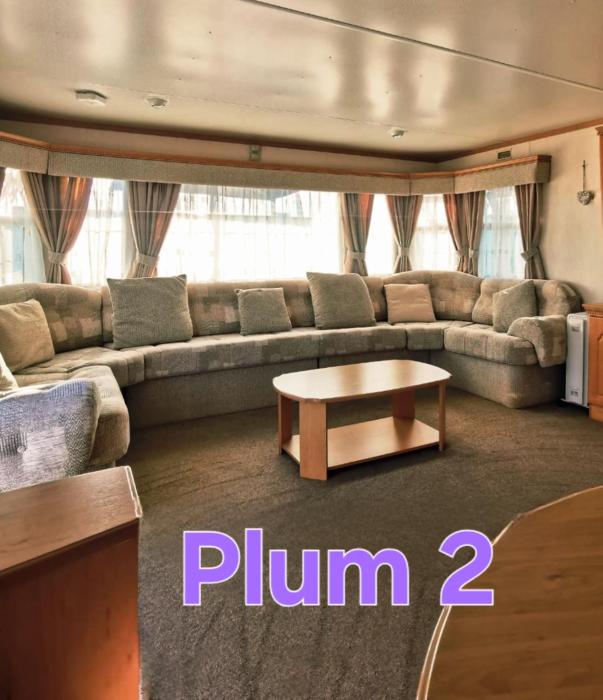 Plum 2, luxury 3 bed 8 berth, gas central heating, bedding included, Static caravan with large wrap around secure veranda on Coral Beach in Ingoldmells