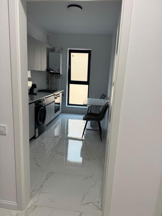 Sandy studio Exigent Plaza