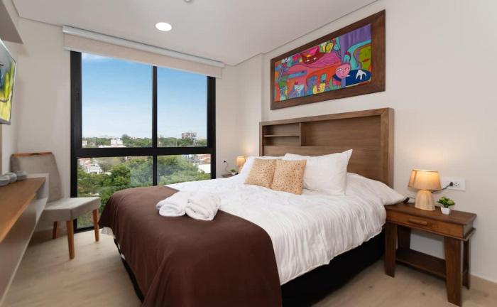 Stylish 1BR Pool & Gym Near Top Malls