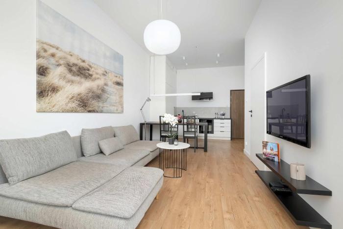 Modern Apartment with Parking and Garden by Noclegi Renters