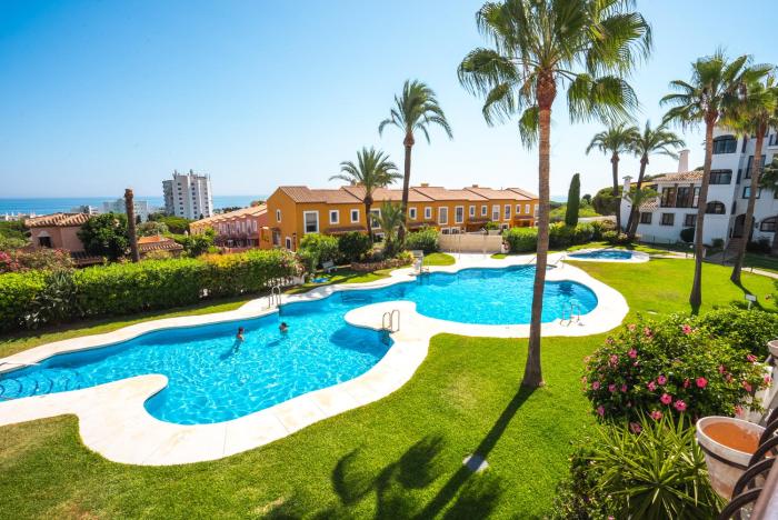 Renovated Apartment with Sea Views and Pool with Private Parking