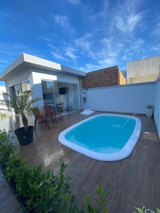 Sobrado ideal para suas férias com piscina