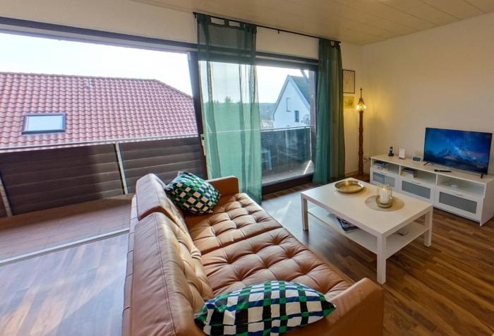 Apartment in Hanglage mit Garten und Balkon