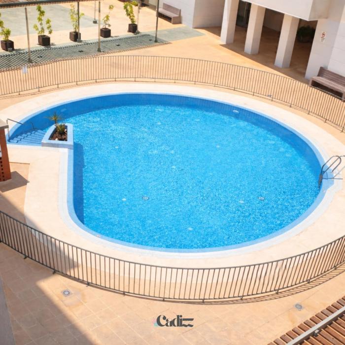 Cadizz Puerto Descanso terrace, pool, and parking