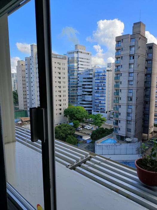 Quarto no apartamento do anfitrião na Praia do Canto