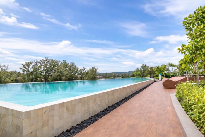 Design Led Apt with Oasis Rooftop in Skypark Laguna