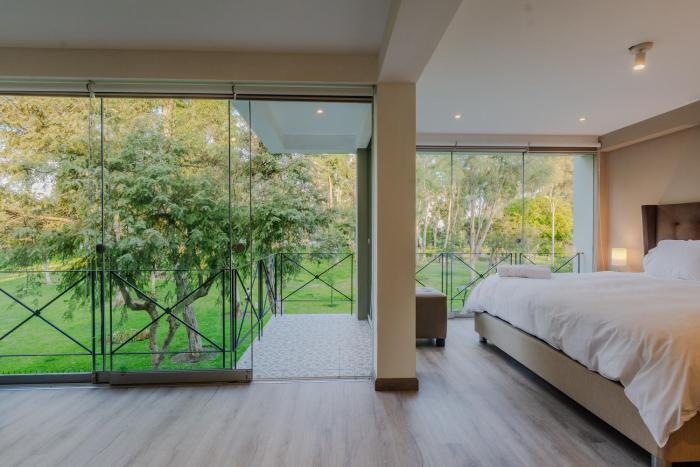 Modern two-bedroom apt with park views San Isidro