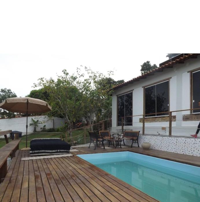 Casa 3 suites com ar, piscina, salão festas, jardim, estacionamento e muito espaço!