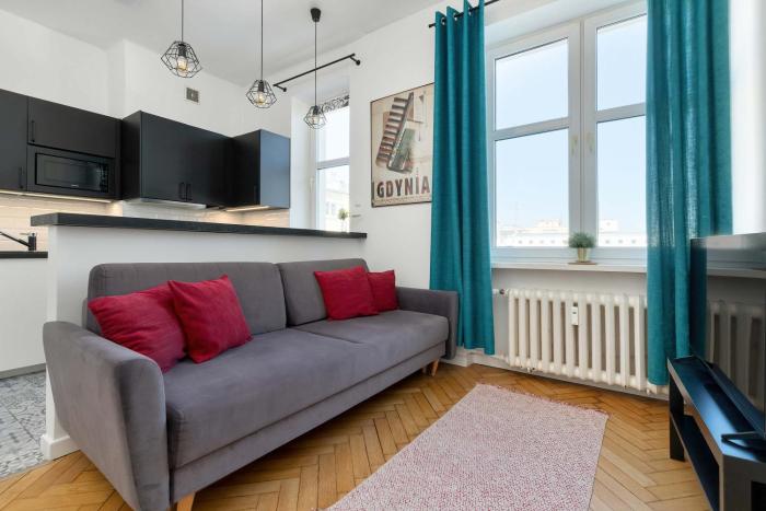 Kompaktowy Apartament w Centrum blisko Plaży Miejskiej by Noclegi Renters
