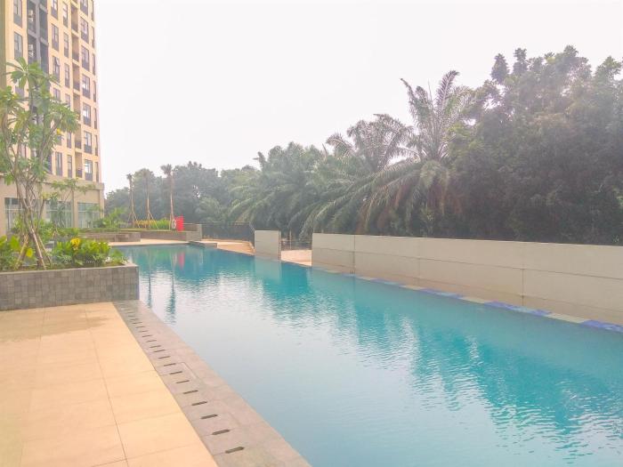 Fancy and Nice Studio Room at Transpark Cibubur Apartment By Travelio