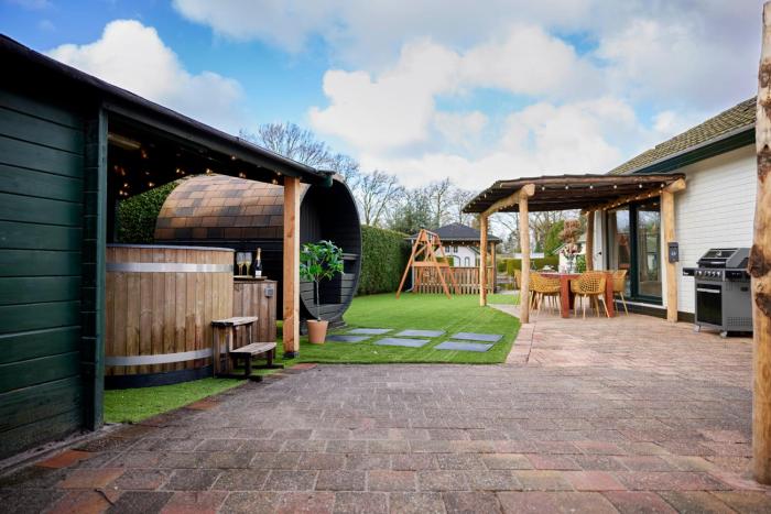 Luxury 8-Person Waterfront Villa Veluwe with Private Hot Tub Sauna and Air Conditioning