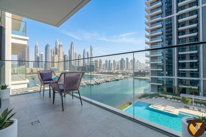 Vogue Vacation Homes, Beach Mansion Waterfront Living Emaar Beachfront near JBR and Palm Jumeirah, Two Bedroom Apartment with Balcony, and Private Beach, Access toAmenities
