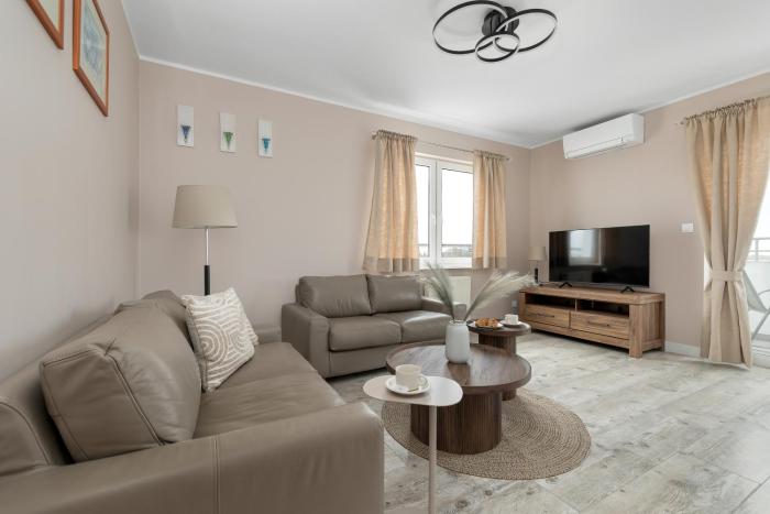 Apartamenty przy plaży Reymonta by Noclegi Renters
