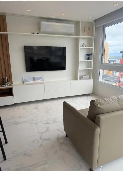 Cem passos entre praia e centro