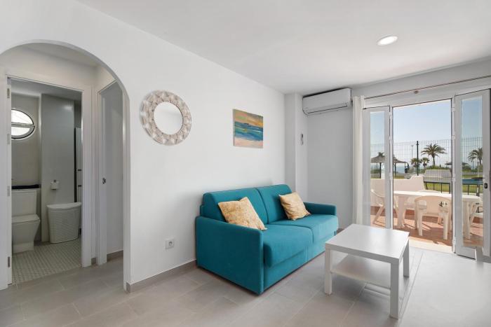 Bajo con terraza 1°linea de playa