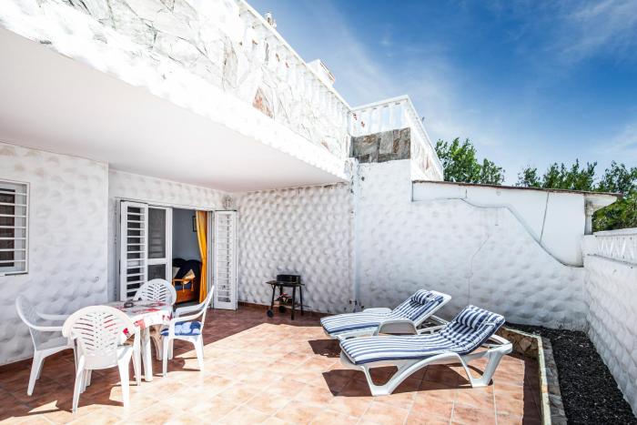 Near the beach with huge terrace, parking and wifi