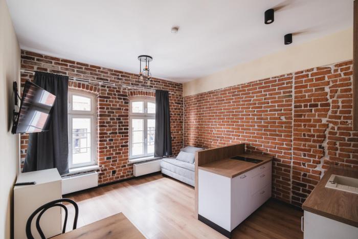 Toruń Old Town Brick Loft Studio by BookingHost