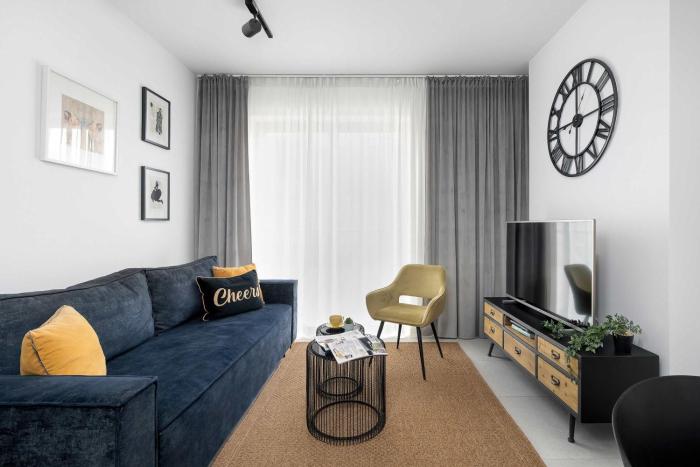 Elegancki Apartament z Parkingiem by Noclegi Renters