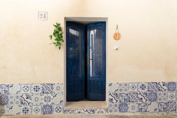 The Blue Door in the historic center of Modica Bassa