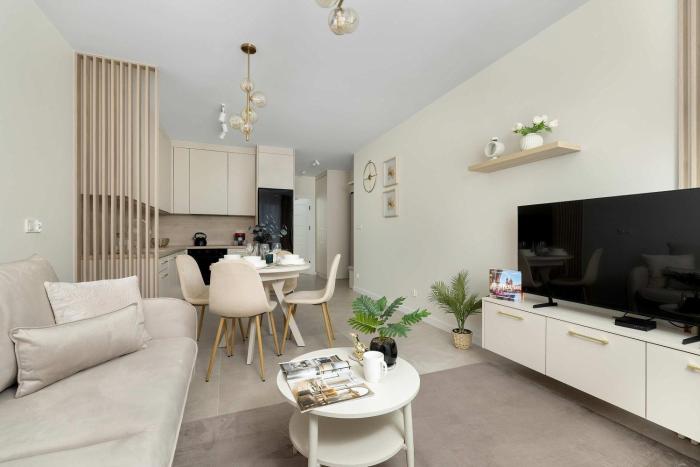 Air-Conditioned Apartment with Parking and Balcony by Noclegi Renters