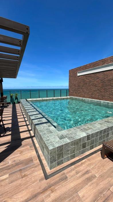 Apartamento vista mar 1 minuto da praia